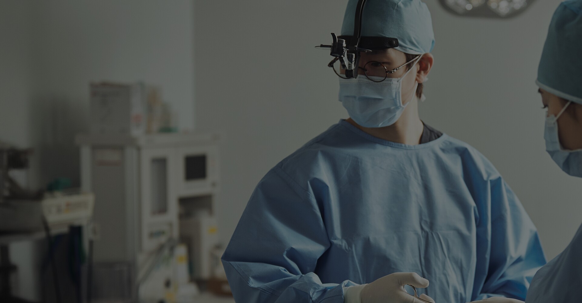 Dr. Lee Young-jae in surgical scrubs