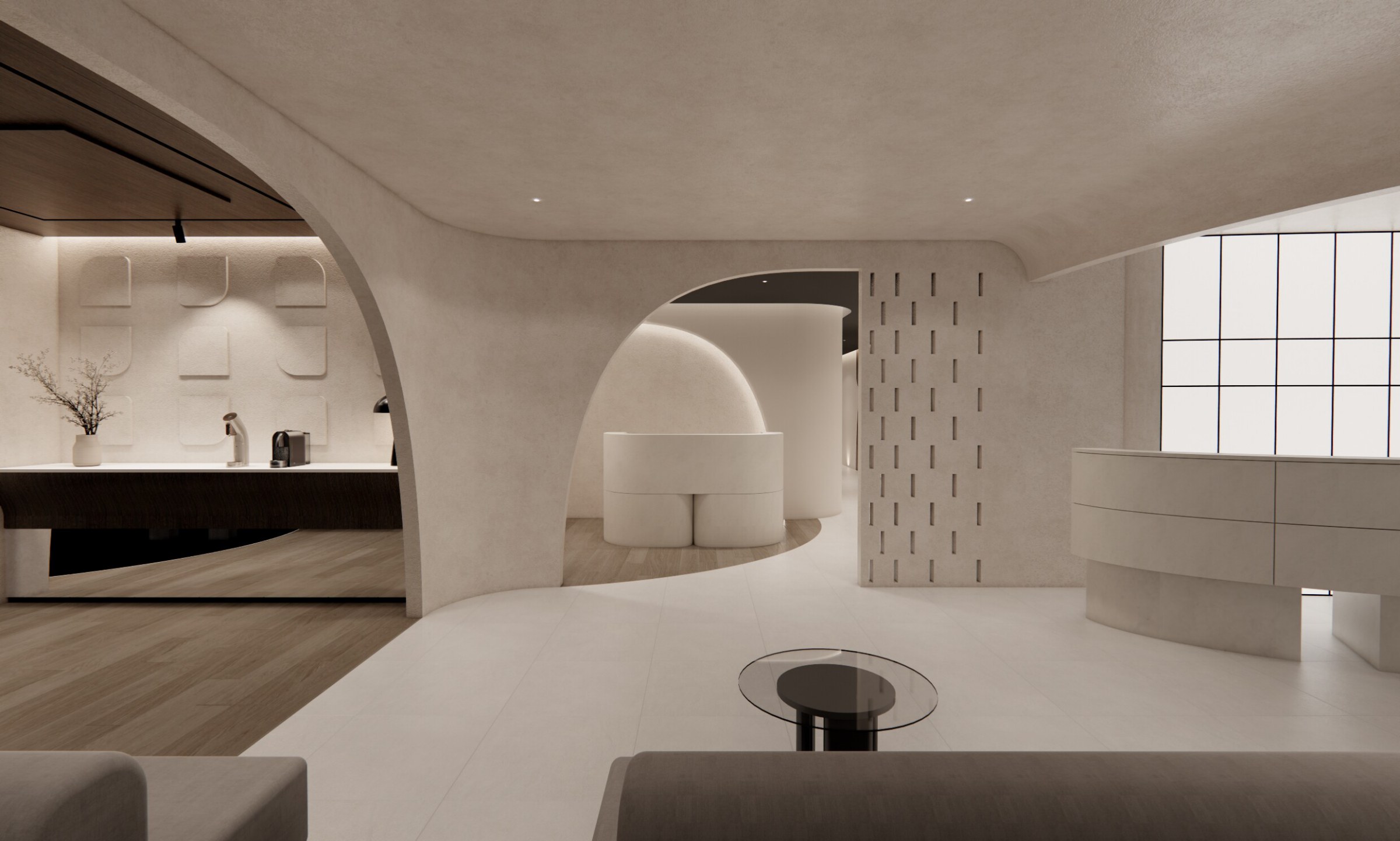 Lounge and information desk seen through an arched passage