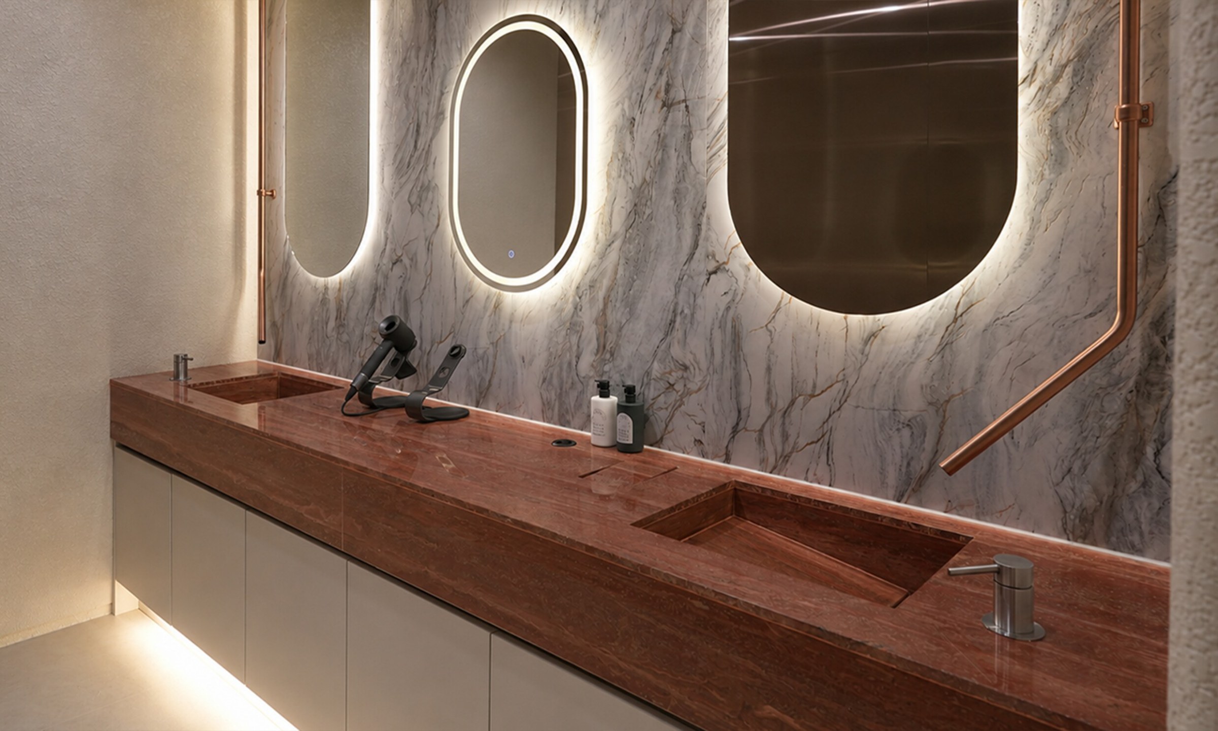Powder room with a red marble sink and oval mirror